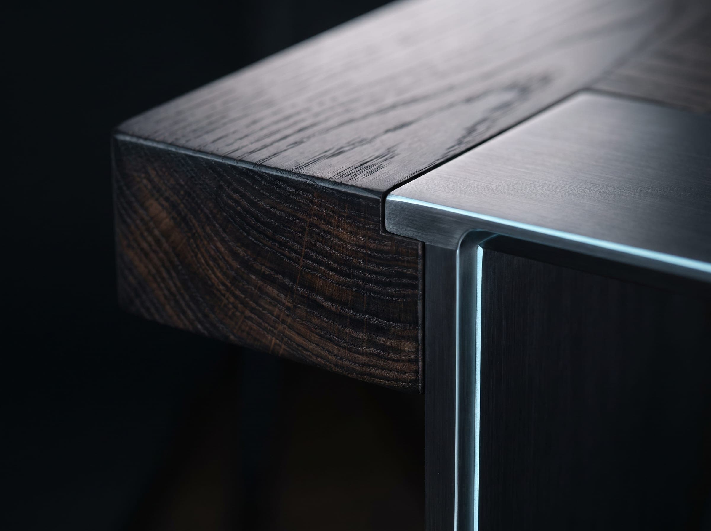 Form/Object concept: macro of the joint between smoked oak and brushed steel